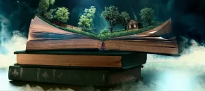 Creative image showing hardbound books, with the top one open. A 3 dimensional landscape on the open pages.