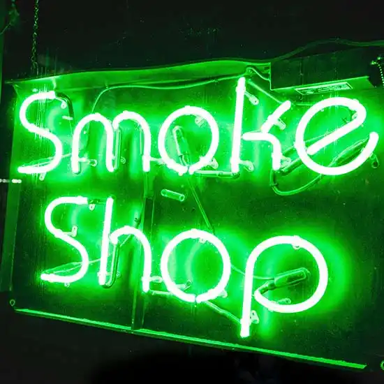 Signage of a smoke shop somewhere in the US, depicting legalization of cannabis.