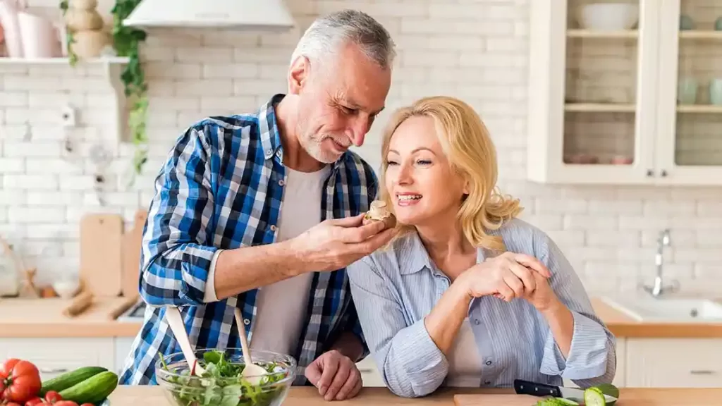 Elderly couple having healthy food