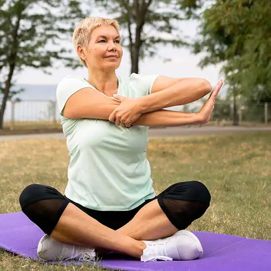 Woman doing stretched on self care day.