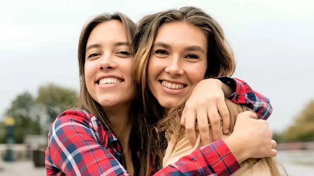 Two friends hugging each other on friendship day