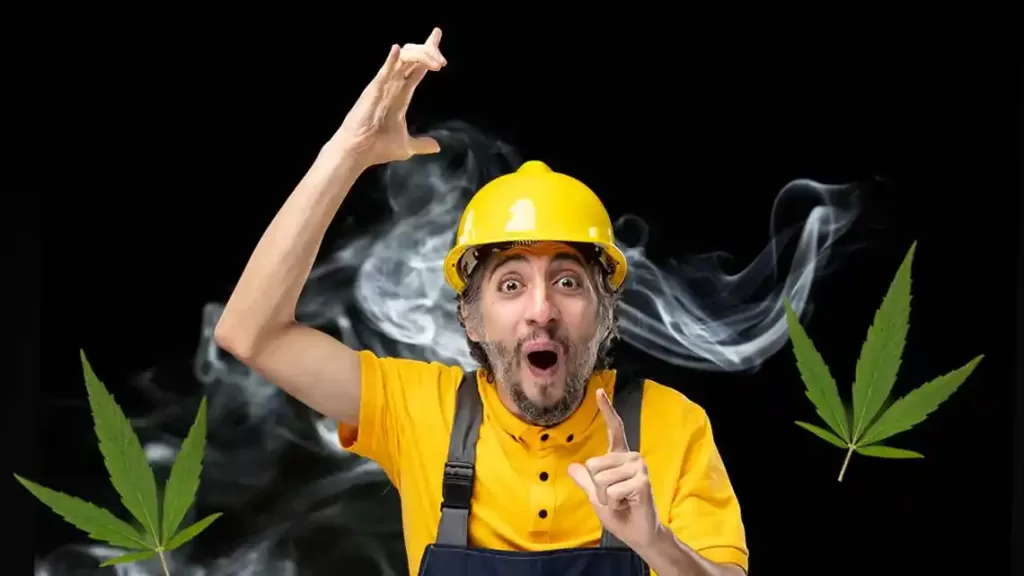 Man in hard hat with smoke behind him, and a cannabis leaf