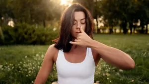 Woman doing breathing exercises for COPD