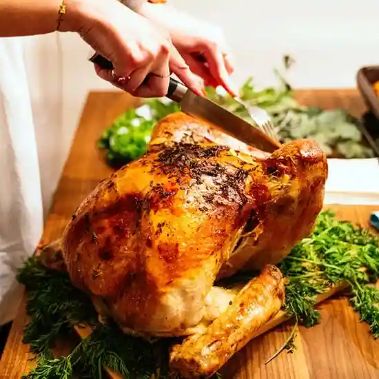 7 Engines Thanksgiving recipes - Cannabis infused Turkey being carved