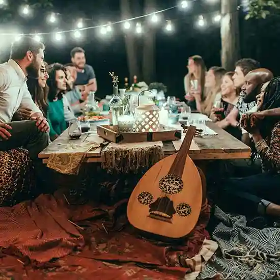 Group of friends at a garden picnic table