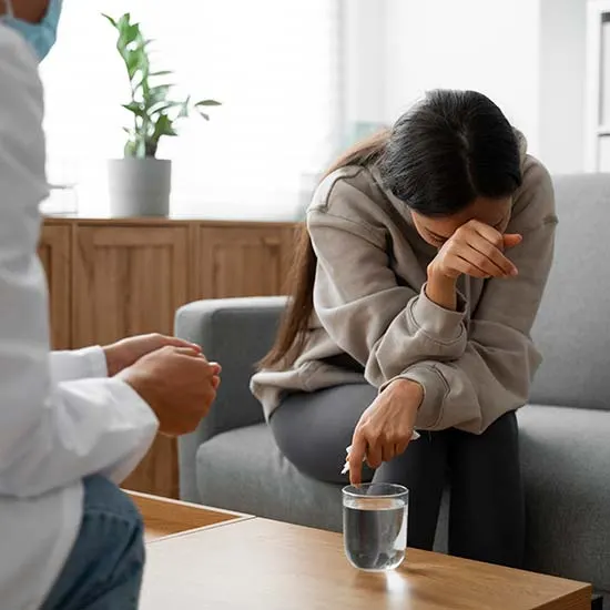 Depressed woman undergoing counselling. Depression if of a side-effect of disabilities